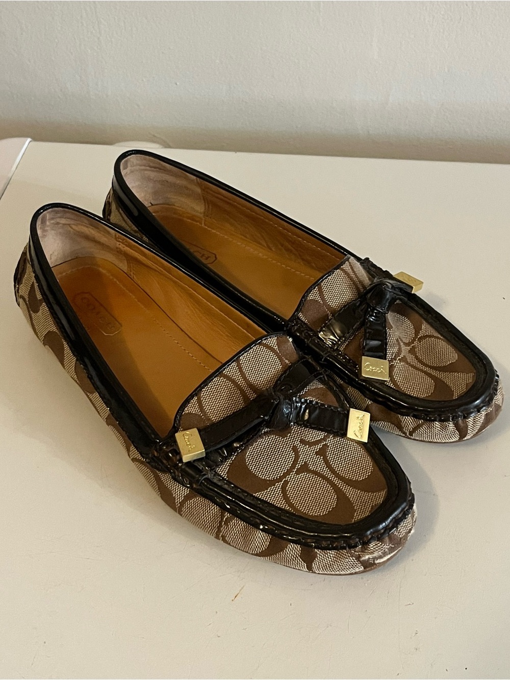 Coach Brown Signature Canvas Slip-On Loafers with Black Trim